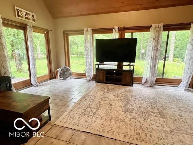 6774 S Becks Grove Rd, Freetown, IN 47235 - tiled living room featuring vaulted ceiling