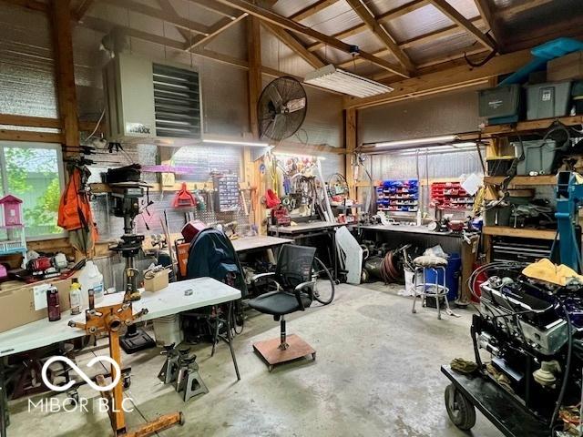 6774 S Becks Grove Rd, Freetown, IN 47235 - garage featuring a workshop area