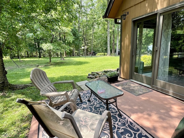 6774 S Becks Grove Rd, Freetown, IN 47235 - view of patio / terrace featuring view of wooded area