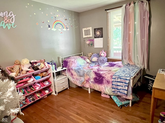 6774 S Becks Grove Rd, Freetown, IN 47235 - bedroom featuring wood finished floors