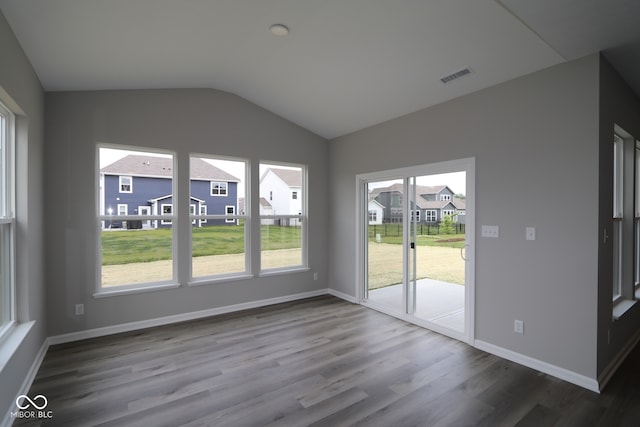 4250 Ironclad Dr, Bargersville, IN 46106 - empty room featuring lofted ceiling, dark wood-style floors, and a residential view