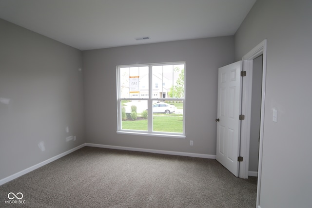 4250 Ironclad Dr, Bargersville, IN 46106 - spare room featuring plenty of natural light and carpet flooring