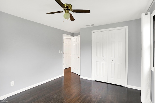 3126 Carriage Rd, West Lafayette, IN 47906 - unfurnished bedroom with baseboards, wood finished floors, a closet, and ceiling fan