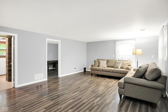 3126 Carriage Rd, West Lafayette, IN 47906 - living room with dark wood finished floors and baseboards