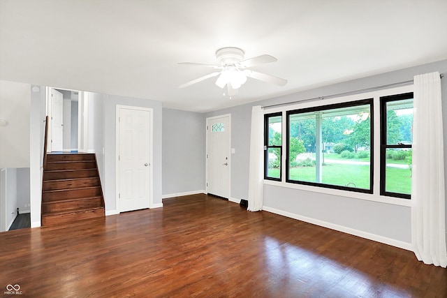 3126 Carriage Rd, West Lafayette, IN 47906 - unfurnished living room featuring a ceiling fan, wood finished floors, healthy amount of natural light, and baseboards