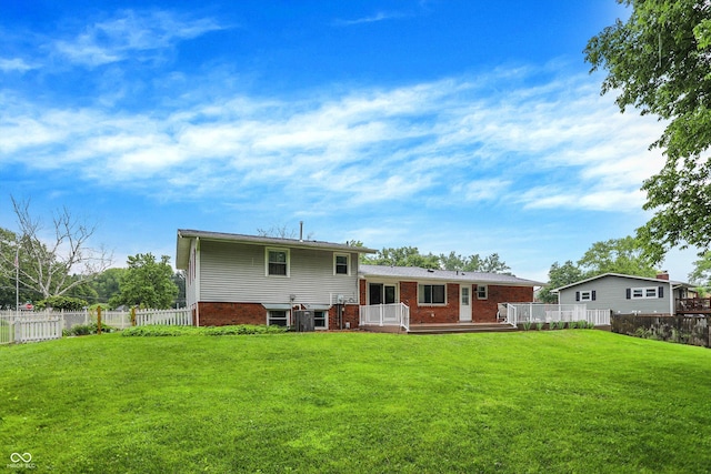 3126 Carriage Rd, West Lafayette, IN 47906 - rear view of house with brick siding and a deck