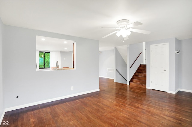 3126 Carriage Rd, West Lafayette, IN 47906 - unfurnished room featuring ceiling fan, wood finished floors, stairway, baseboards, and recessed lighting