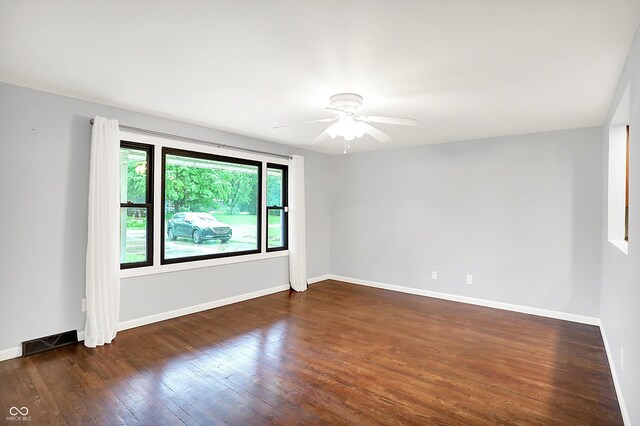 3126 Carriage Rd, West Lafayette, IN 47906 - empty room with wood finished floors, a ceiling fan, and baseboards