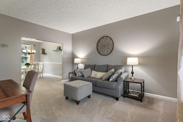 9756 Brook Meadow Dr, Mccordsville, IN 46055 - living room featuring carpet flooring, a chandelier, baseboards, and a textured ceiling