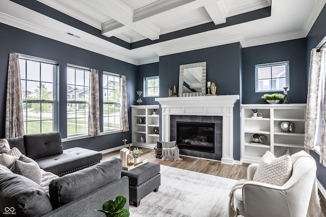 15596 Edenvale Dr, Westfield, IN 46074 - living room featuring ornamental molding, healthy amount of natural light, wood finished floors, beam ceiling, and coffered ceiling
