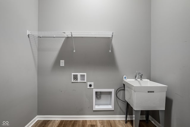 15596 Edenvale Dr, Westfield, IN 46074 - laundry room with electric dryer hookup, wood finished floors, washer hookup, and baseboards