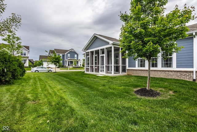 15596 Edenvale Dr, Westfield, IN 46074 - view of green lawn featuring a sunroom