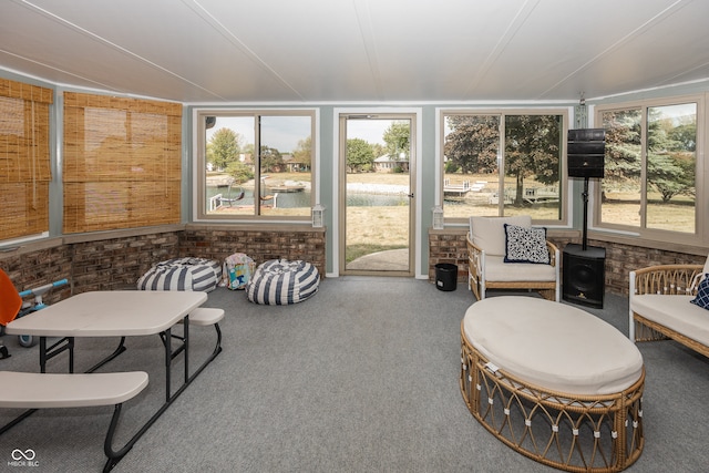 28 Patriot Ct, Greenfield, IN 46140 - sunroom / solarium with brick wall, carpet, and a wood stove
