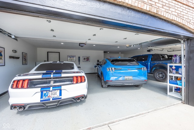 28 Patriot Ct, Greenfield, IN 46140 - garage with a garage door opener