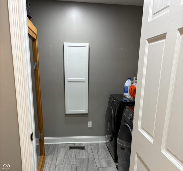 28 Patriot Ct, Greenfield, IN 46140 - washroom with independent washer and dryer and baseboards