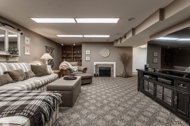 8905 Washington Blvd W Drive, Indianapolis, IN 46240 - living area featuring carpet flooring, a fireplace, and built in features