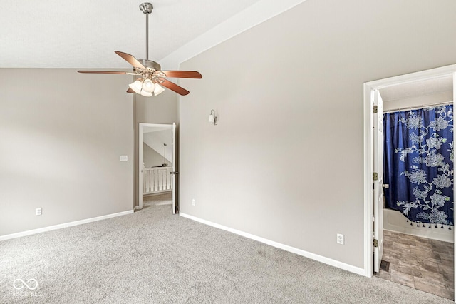 11072 Lake Run Dr, Fishers, IN 46038 - carpeted spare room with a ceiling fan, vaulted ceiling, and baseboards