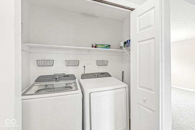 11072 Lake Run Dr, Fishers, IN 46038 - laundry room featuring separate washer and dryer, carpet floors, and baseboards