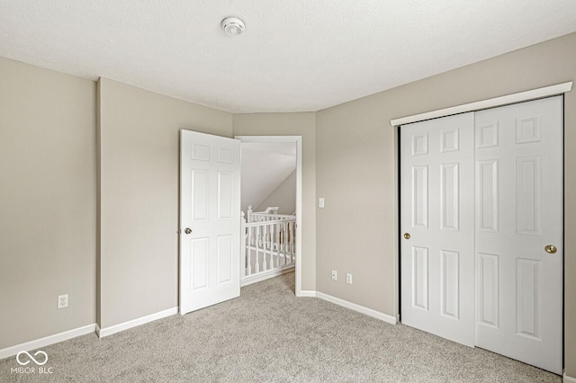 11072 Lake Run Dr, Fishers, IN 46038 - unfurnished bedroom featuring carpet floors, baseboards, and a closet