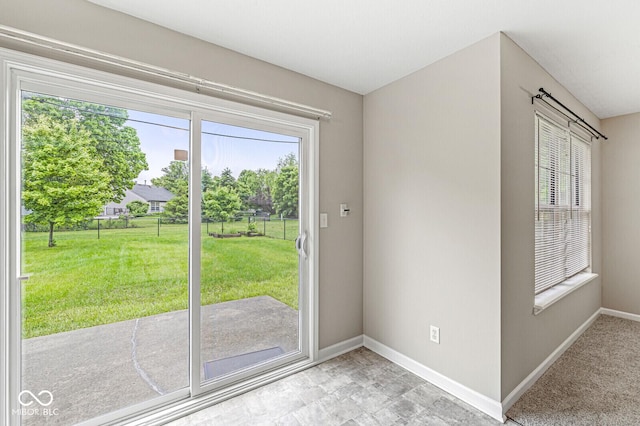 11072 Lake Run Dr, Fishers, IN 46038 - doorway to outside with healthy amount of natural light and baseboards