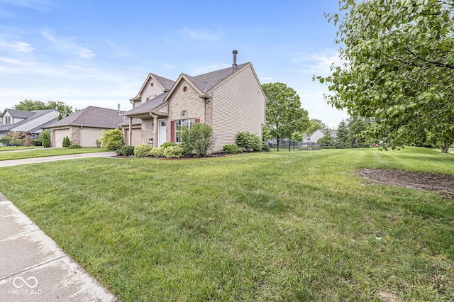 11072 Lake Run Dr, Fishers, IN 46038 - view of front of house featuring brick siding, a garage, and concrete driveway