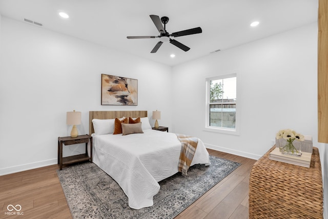 1027 Hosbrook St, Indianapolis, IN 46203 - bedroom featuring wood finished floors, recessed lighting, baseboards, and ceiling fan