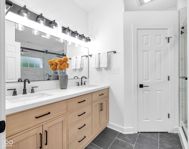 1027 Hosbrook St, Indianapolis, IN 46203 - bathroom with double vanity, a stall shower, and baseboards