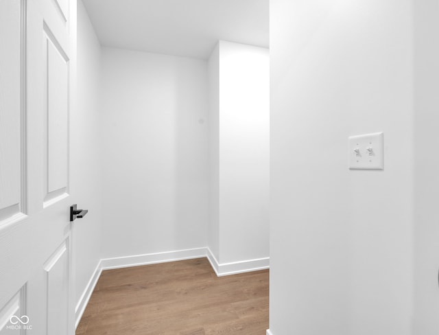 1027 Hosbrook St, Indianapolis, IN 46203 - hallway with wood finished floors and baseboards