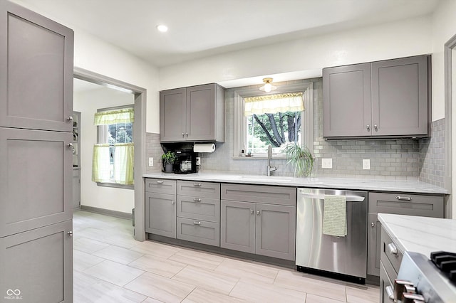 1725 W 53rd St, Indianapolis, IN 46228 - kitchen featuring stainless steel dishwasher, gray cabinets, plenty of natural light, and recessed lighting