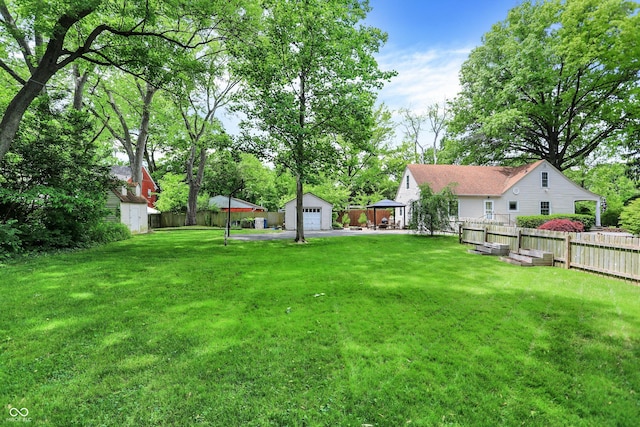 1725 W 53rd St, Indianapolis, IN 46228 - view of yard featuring a garage and an outdoor structure