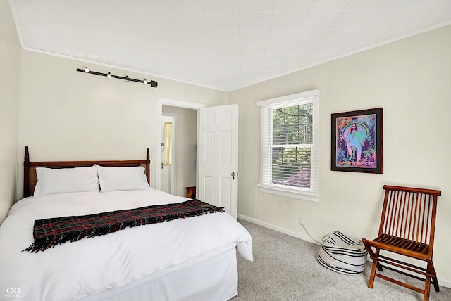 1725 W 53rd St, Indianapolis, IN 46228 - bedroom featuring carpet floors, crown molding, and baseboards