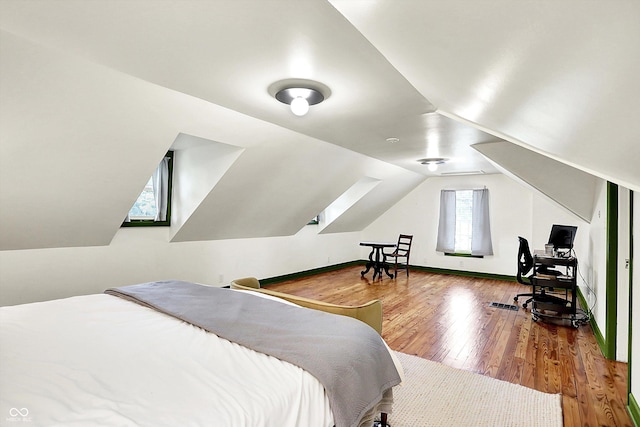 1725 W 53rd St, Indianapolis, IN 46228 - bedroom with wood finished floors and lofted ceiling