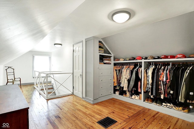 1725 W 53rd St, Indianapolis, IN 46228 - walk in closet featuring lofted ceiling and hardwood / wood-style flooring