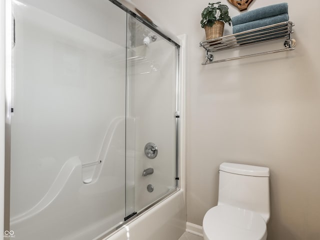 13069 Abraham Run, Carmel, IN 46033 - bathroom with bath / shower combo with glass door, toilet, and baseboards