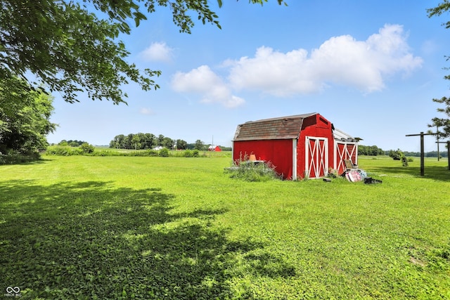 25420 Jerkwater Rd, Sheridan, IN 46069 - view of grassy yard featuring a storage unit and a view of rural / pastoral area