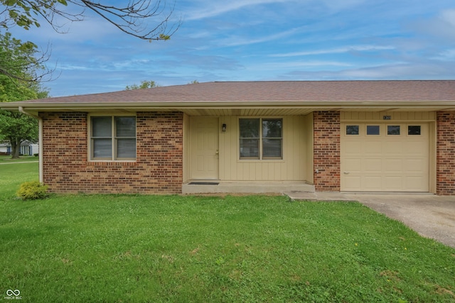 1367 Brookside Ct, Columbus, IN 47201 - single story home featuring concrete driveway, a front yard, an attached garage, and brick siding