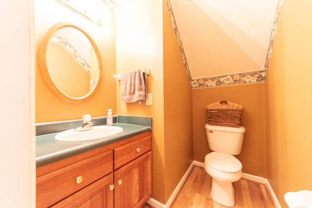 977 Canary Creek Dr, Franklin, IN 46131 - half bath featuring vanity and wood finished floors