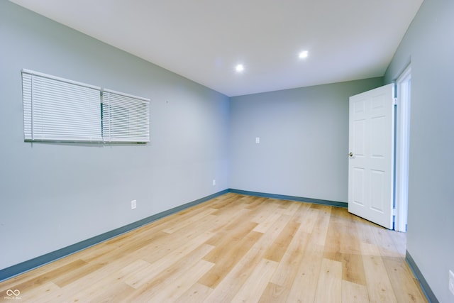 5002 E Washington St, Indianapolis, IN 46201 - unfurnished room with light wood-style flooring and recessed lighting
