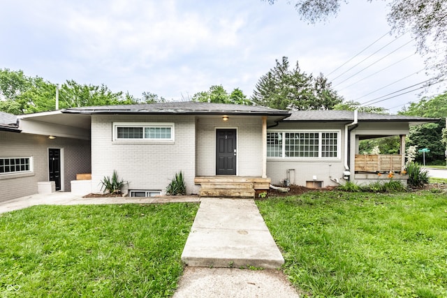 5002 E Washington St, Indianapolis, IN 46201 - ranch-style home with brick siding and a front lawn