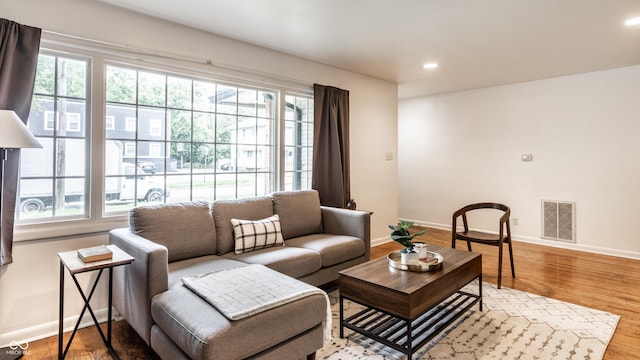 5002 E Washington St, Indianapolis, IN 46201 - living area with healthy amount of natural light, wood finished floors, and recessed lighting