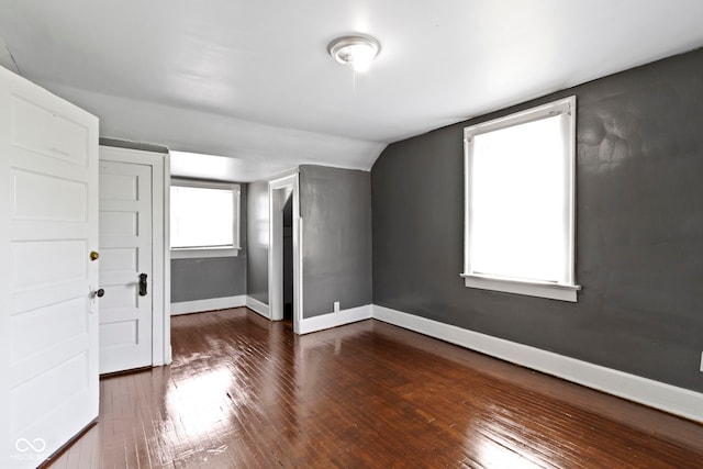 1021 W 37th St, Indianapolis, IN 46208 - additional living space with baseboards, lofted ceiling, and dark wood-style floors