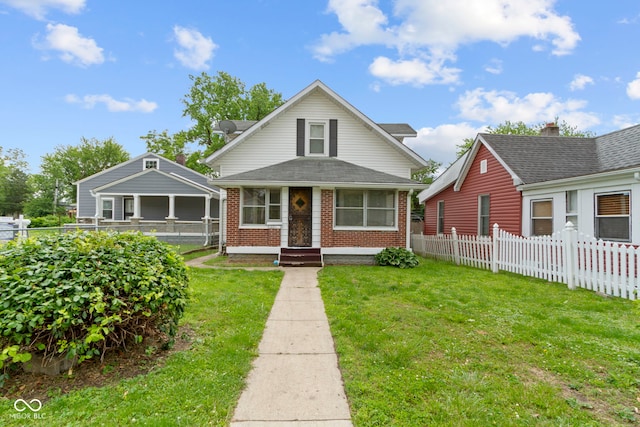 1021 W 37th St, Indianapolis, IN 46208 - bungalow with brick siding and roof with shingles