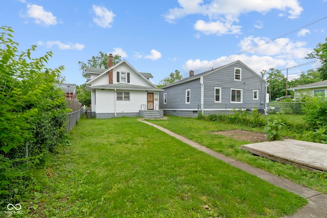 1021 W 37th St, Indianapolis, IN 46208 - back of house with central AC unit