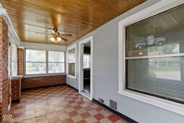 1021 W 37th St, Indianapolis, IN 46208 - unfurnished sunroom featuring a ceiling fan