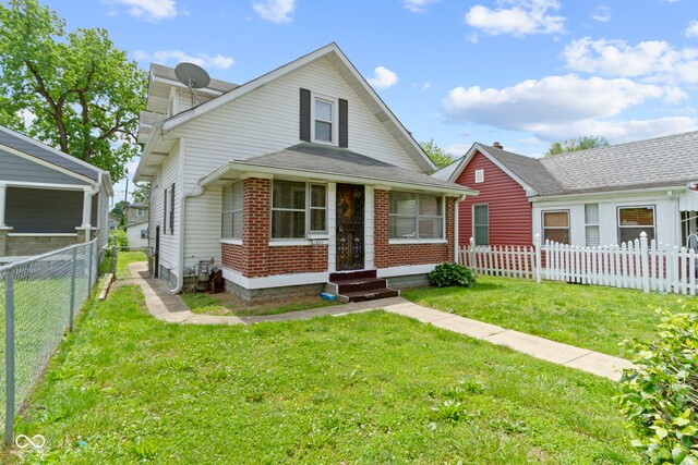 1021 W 37th St, Indianapolis, IN 46208 - bungalow-style home with brick siding