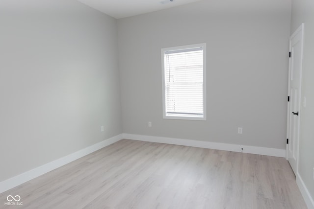 4625 W Naomi St, Indianapolis, IN 46241 - empty room featuring light wood finished floors and baseboards