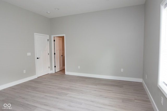 4625 W Naomi St, Indianapolis, IN 46241 - spare room with light wood-style floors and baseboards