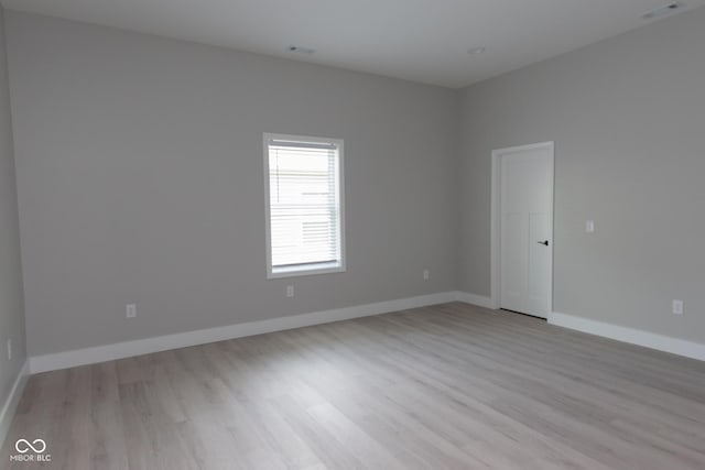 4625 W Naomi St, Indianapolis, IN 46241 - spare room featuring light wood-type flooring and baseboards