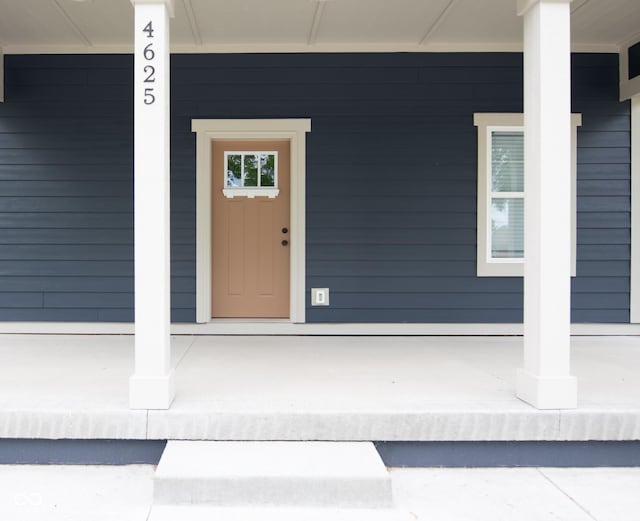 4625 W Naomi St, Indianapolis, IN 46241 - view of exterior entry featuring a porch