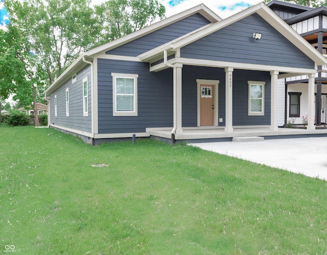 4625 W Naomi St, Indianapolis, IN 46241 - view of front facade with a front lawn and a porch
